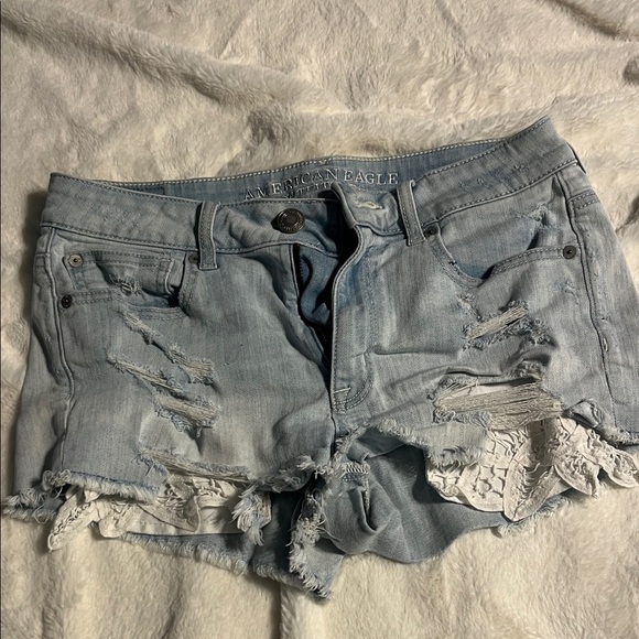 American Eagle Outfitters Light Blue Ripped Jean Shorts - Picture 1 of 4